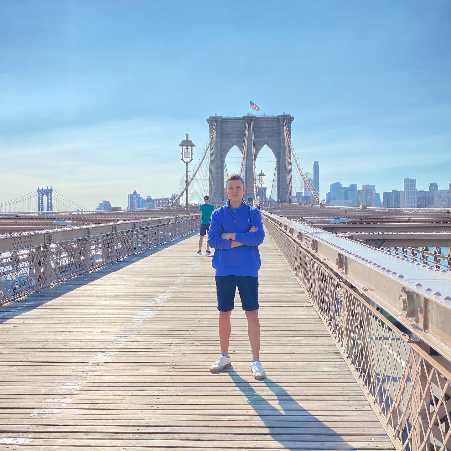 Man ыефтвы on Brooklyn bridge
